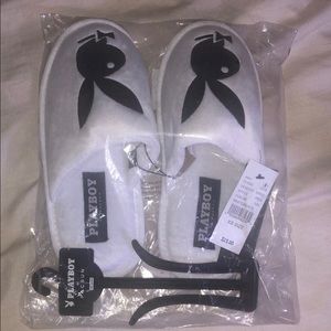 white and black playboy slippers